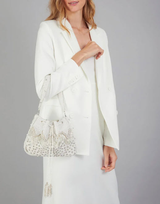 Pearly embellished pouch bag by Monsoon at GettingHitched.co.uk